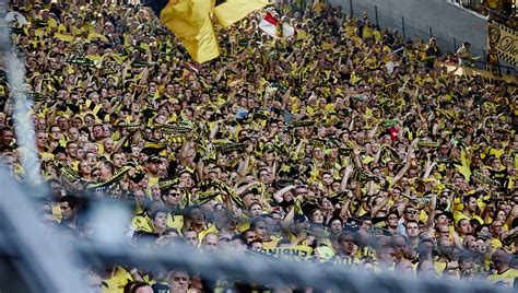 You won't see that anywhere except in westfalenstadion (signal iduna park). The Yellow Wall | Borussia Dortmund - SoccerBible