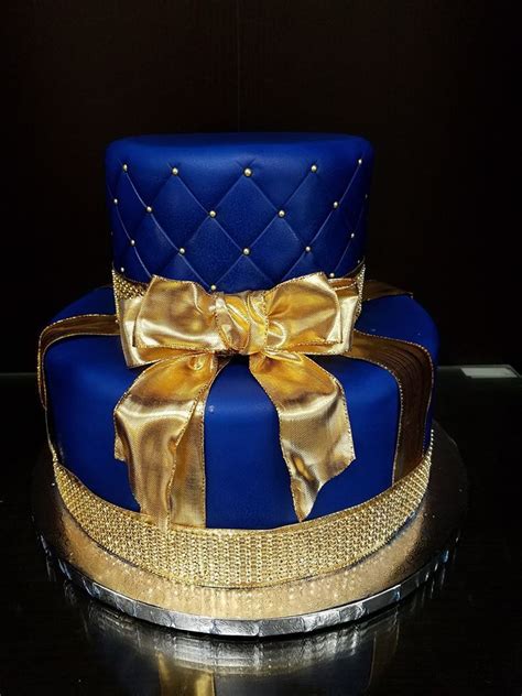 It is known for its distinctive royal blue round tin container. Royal Blue and Gold Baby Shower Cake | Baby Shower Cakes ...