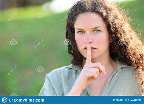 Serious Woman Asking For Silence In A Park Stock Photo Image Of Icon
