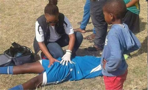 Photo Of A Female Paramedic Attending To A Male Footballer Goes Viral