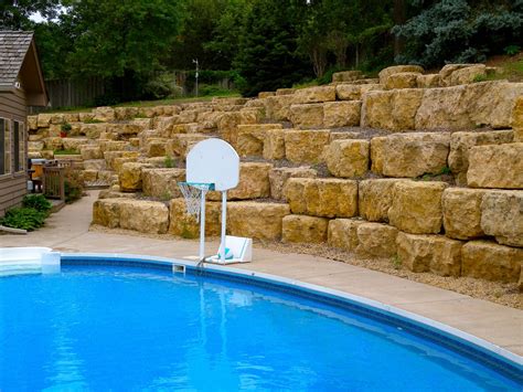 Retaining boulder walls are beautiful and timeless maintenance of landscape. Boulder Retaining Walls - Boulder Images Inc.