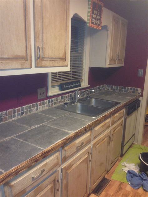 This will help the latex paint to adhere to the surface of the. Tiled countertops with Glaze Couture over chalk painted ...