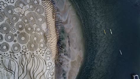 This Mysterious Sand Artist Is Transforming Geelong And Surf Coast Beaches Into Colossal Homages