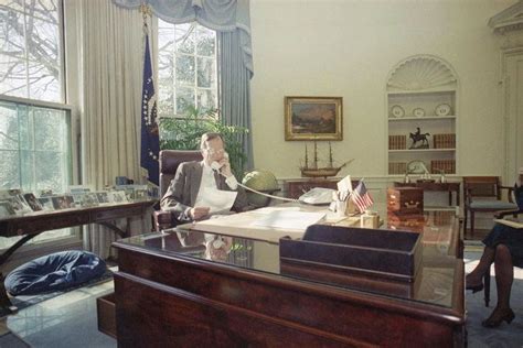 President George H W Bush Speaks By Telephone From The Oval Office Of