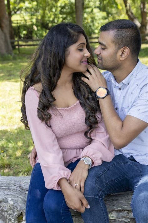 Asian Indian Married Couple Being Romantic In A Park Like Setting Stock Image Image Of Dress