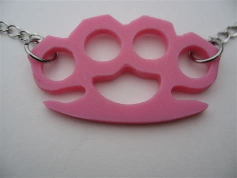 Pink Plastic Brass Knuckles By Marty Flint Chokers