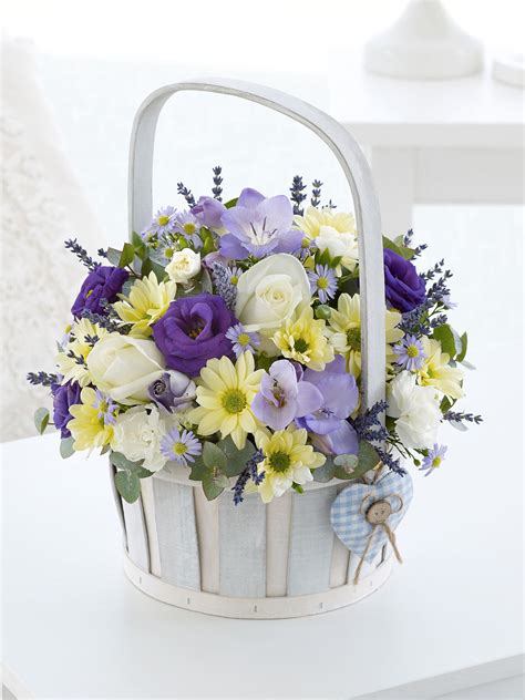 This baby boy flower arrangement is available for same day delivery in durban. Baby Boy Basket | Basket flower arrangements, Flower ...