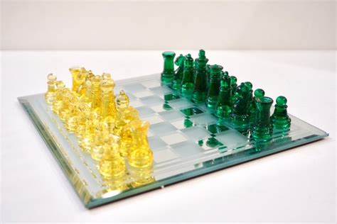 You'll often see modern chess sets that are plastic, glass, metal, or stone, and this style of chess set is where we see the most open. Contemporary Minimalist Green and Yellow Murano Glass ...