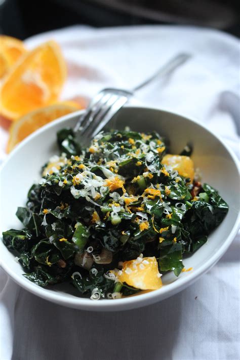 Warm Tuscan Kale Salad With Garlic Chips Oranges And Pecans Girl And