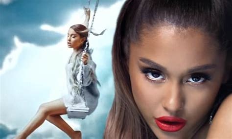 Ariana Grande Flashes Legs As She Swings Through Heavenly Landscape In