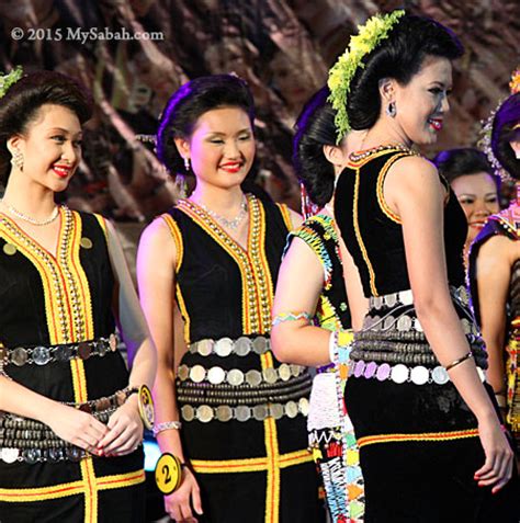 The men's jacket and trousers bear some chinese influence. Tangkong, timeless accessory of Kadazan Dusun costumes ...