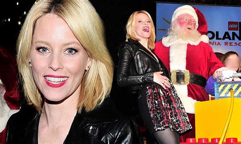 Elizabeth Banks Shows Her Festive Spirit In A Plaid Skirt And Leather