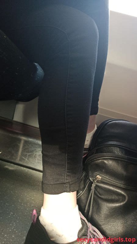 sexycandidgirls top legs in tight black jeans and ankles closeup creepshot in a public bus