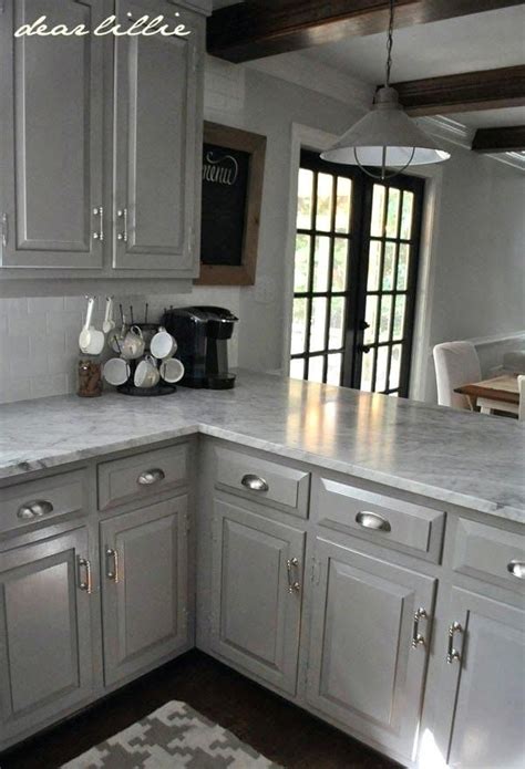 The paint color may change slightly over time, and you may notice . Light Gray Kitchen Cabinets With White Appliances Gray ...