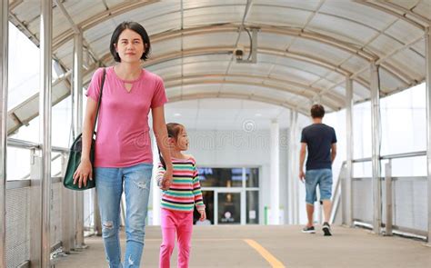 Asian Mother Holding Hands Her Daughter Walking On Overpass Mon And