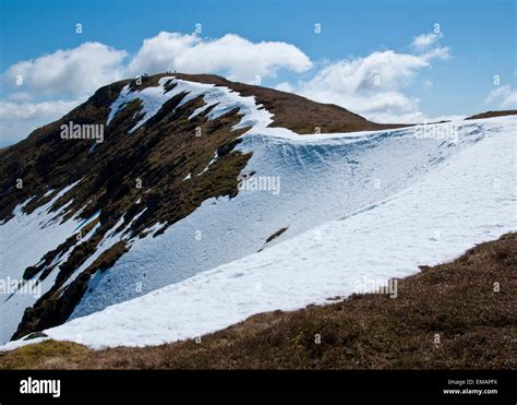 Summit Of Ben Ledi Mountain With Snow On The Ridge Trossachs National