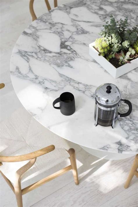 The small size fits well in compact. 10 White Marble Dining Tables You'll Adore