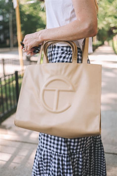 Medium fits a laptop + your daily. bag it: telfar small shopping bag