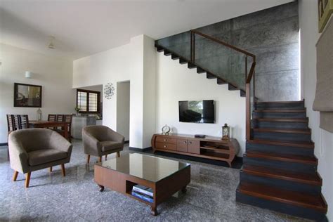 Polished granite floor and wall tile (10 sq. Living Room with granite Flooring tiles, Design by Kamat ...