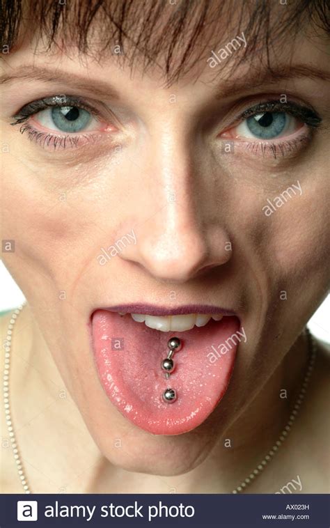 Close Up Of A Female Face With Tongue Pierced 3 Times