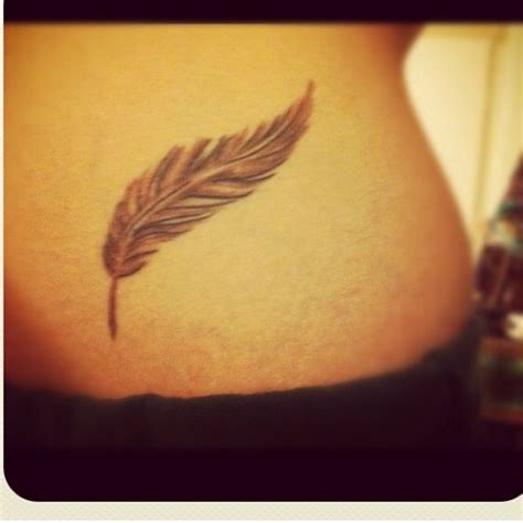 Check spelling or type a new query. black and brown feather tattoo on stomach | Tattoos, Feather tattoo, Tattoo designs