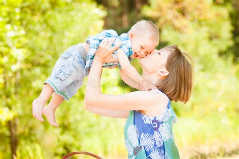 Mom And Son Playing Outdoor Together Stock Photo Image Of Love