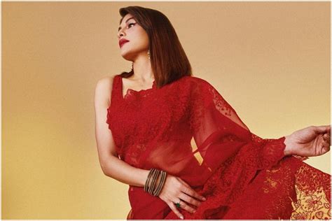 jacqueline fernandez looks radiant and drop dead gorgeous in rs 54k red embroidered saree