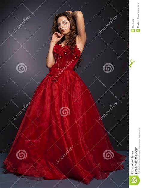 Beautiful Long Haired Woman In Red Dress Stock Photo