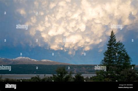 Striking Display At Sunset As Mammatus Cloud Is Under Lit By The Low