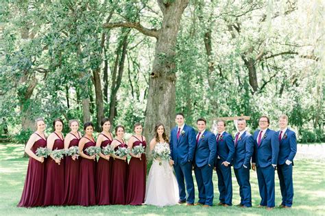 Bridal Party Pose Ideas Burgundy And Blush Bridesmaids Dresses Groomsmen In Navy Suits