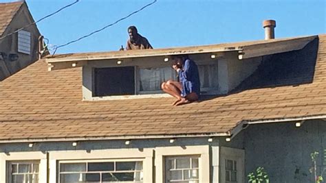 woman s dramatic rooftop escape caught on camera