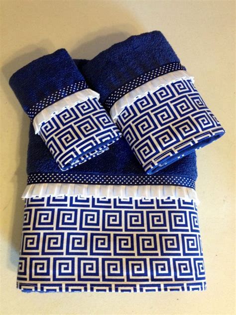 As an alternative to the standard terry cloth towel you are used to, these peshtemal towels are flat and tightly woven for strength and durability. Royal Blue and White Greek Key and Polka Dot by ...