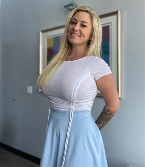 Curves Stunning Woman In White Top And Blue Skirt