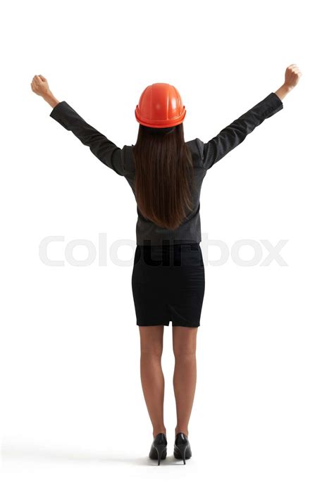 woman raising her hands up stock image colourbox