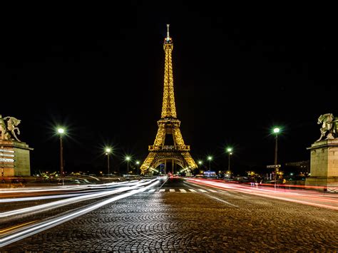 France Eiffel Tower Paris Traffic Trails And Street Lights In The Night