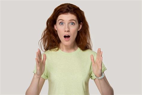 Young Surprised Woman Showing Large Big Size Measurement Gesture Stock