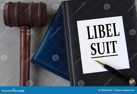 Libel Suit Words On A White Sheet With Leather Notebooks A Judge S