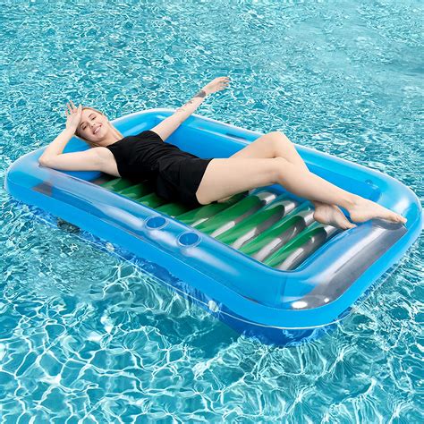 This Inflatable Sunbathing Pool Lounger Doubles As A Mini Pool