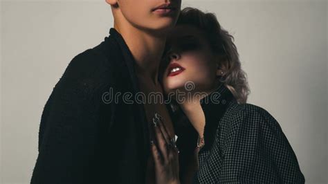 Affectionate Couple Having A Fun While A Photo Session Young Heterosexual Couple Embracing