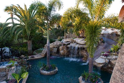 Lagoon Pool And Spa With Large Grotto Waterfall And Slide By Lucas