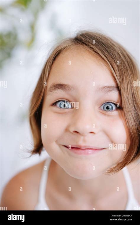 Close Up Photo Of A Little Girl Making Funny Face Stock Photo Alamy