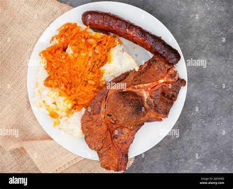 Flat Lay Of Traditional South African Braai Or Shisa Nyama Meat Cooked