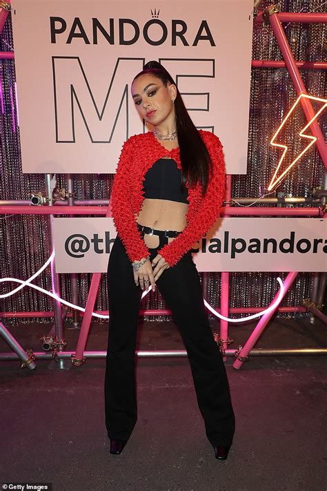 Charli Xcx Showcases Her Taut Abs In Black Cutout Chaps As She Performs
