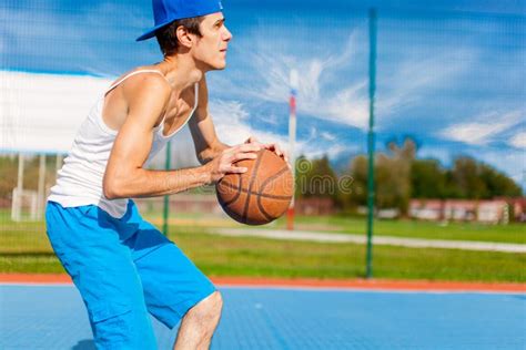 Young Guy Is Playing Basketball Stock Photo Image Of Basketball