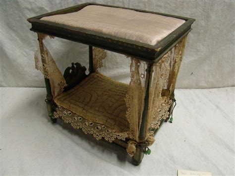 It was a present given to me in 1950 and it is in perfect condition. Antique Doll Canopy Bed