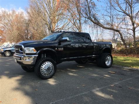 Super clean and ready to roll. 2016 RAM 3500 LARAMIE MEGA CAB DUALLY LIFTED ...