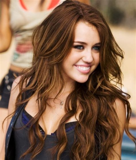 The top is smoothed out to sit flat on the head to show how versatile long wavy hair can be. Miley Cyrus Wild Brown Wavy Hairstyles: Sexy Hairstyles ...
