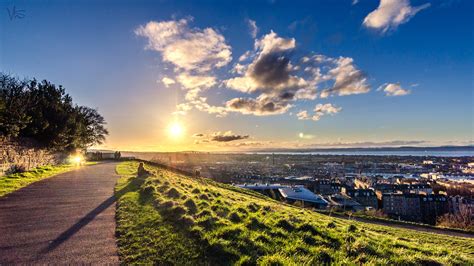 Edinburgh Panorama Scotland With Background Of Blue Sky And Clouds