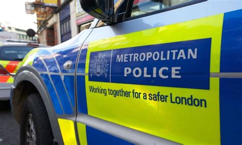 Two Met Police Officers Charged With Assault Amid Claims Of Excessive Force London The Guardian