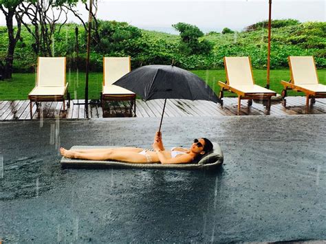 Olivia Munn Flaunts Bikini Body During Rain Storm